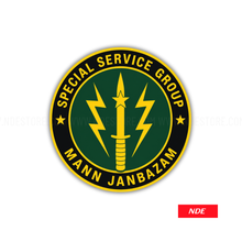 Circular logo with 'Special Service Group Mann Janbazam' text and symbols on a white background.